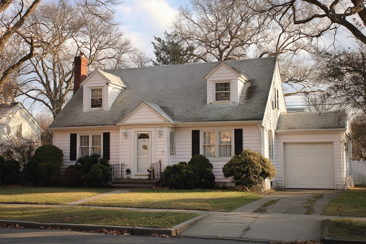 Cape Cod style home being divided in divorce settlement Long Island NY